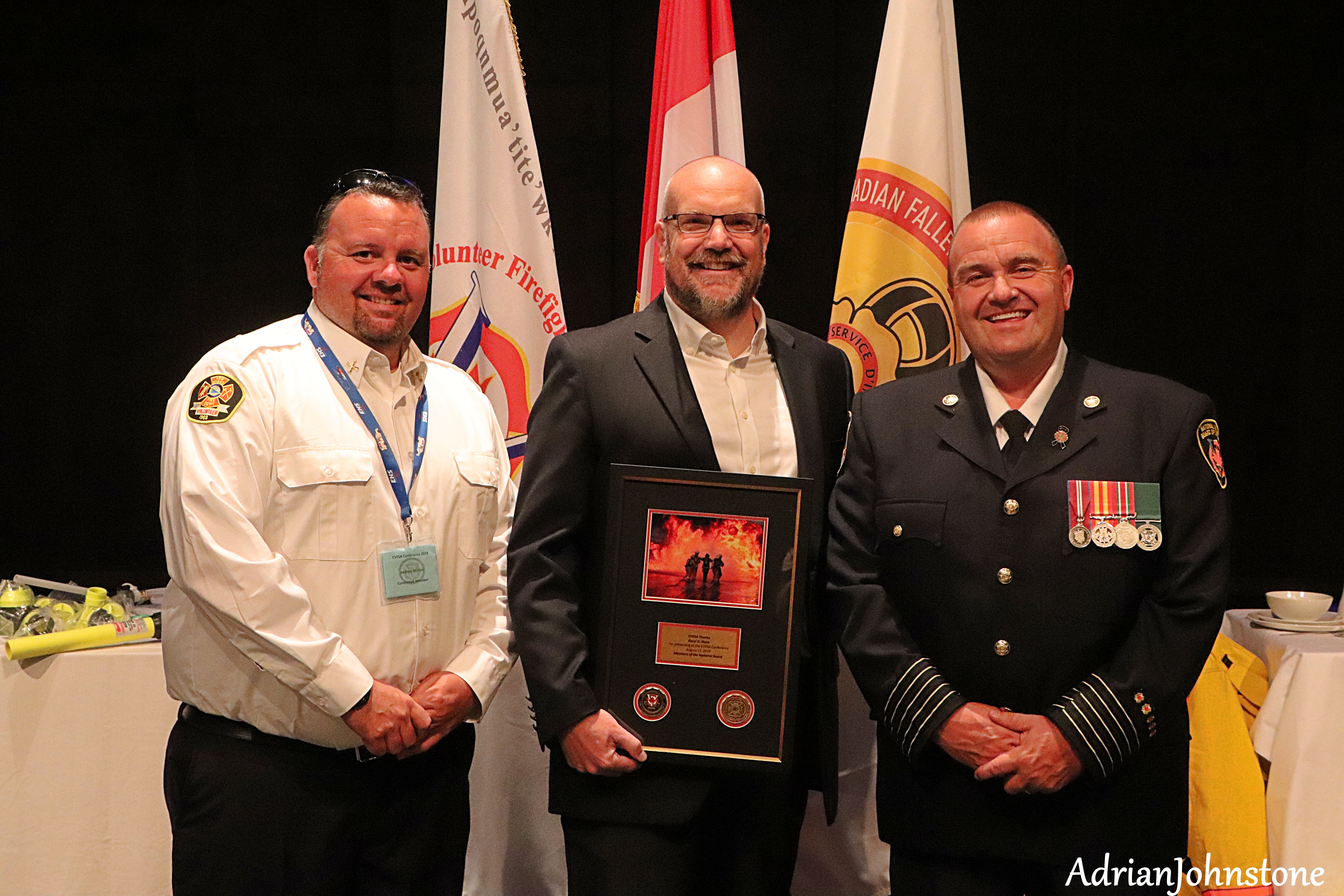Daryl D. Black receiving recognition from the Canadian Volunteer Fire Services Association, August 2019